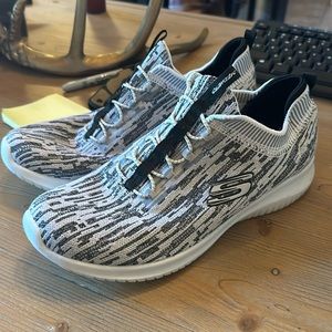 Women’s Skechers slide on walking/athletic shoes. Worn once. Size W8.5